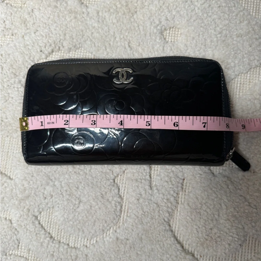 Authentic  Chanel Camelia patent leather zip around‎ wallet long